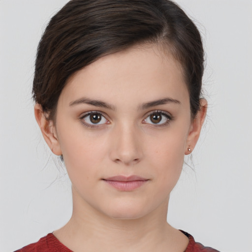 Neutral white young-adult female with medium  brown hair and brown eyes