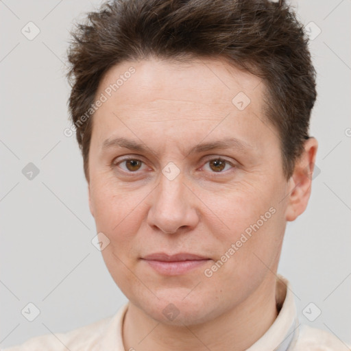 Joyful white adult female with short  brown hair and brown eyes