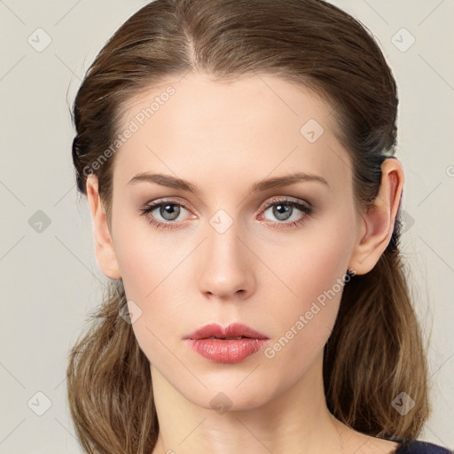 Neutral white young-adult female with medium  brown hair and grey eyes