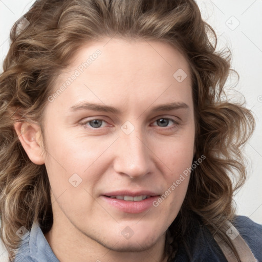 Joyful white young-adult female with medium  brown hair and blue eyes