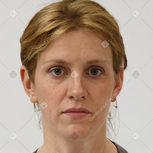 Joyful white adult female with short  brown hair and brown eyes