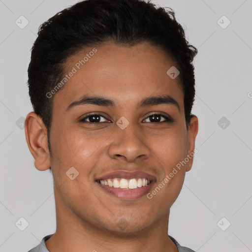 Joyful latino young-adult male with short  brown hair and brown eyes