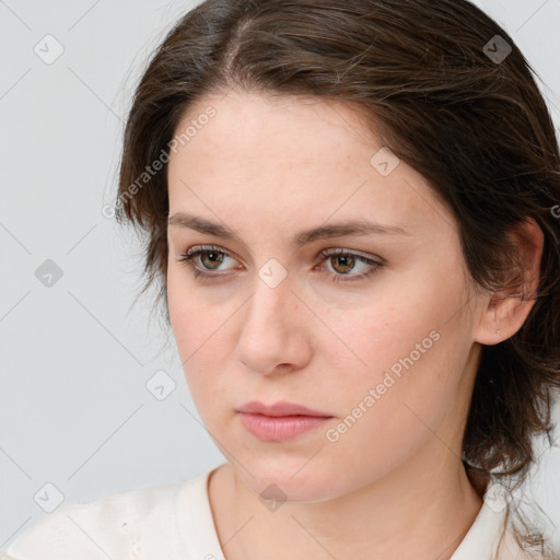 Neutral white young-adult female with medium  brown hair and brown eyes