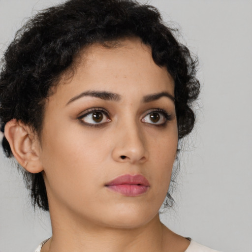 Neutral latino young-adult female with short  brown hair and brown eyes