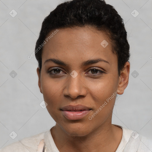 Joyful latino young-adult female with short  black hair and brown eyes