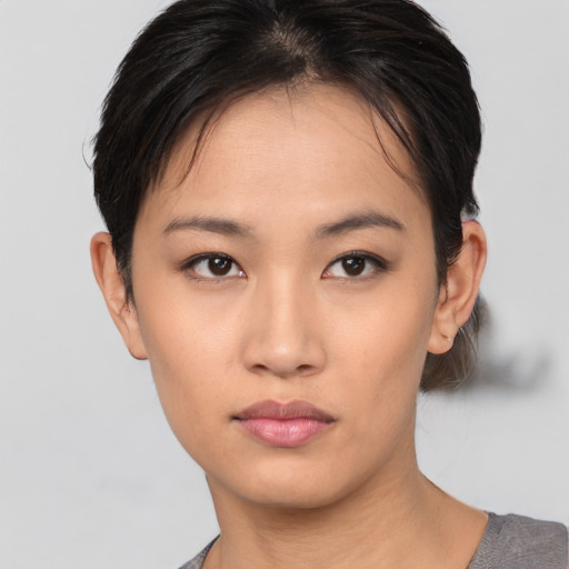 Neutral asian young-adult female with short  black hair and brown eyes