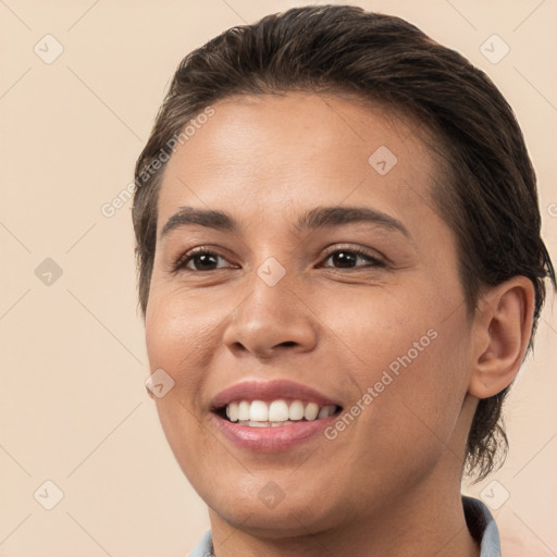 Joyful white young-adult female with short  brown hair and brown eyes