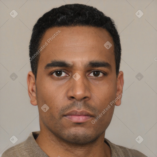 Neutral latino young-adult male with short  black hair and brown eyes