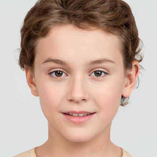 Joyful white child male with short  brown hair and brown eyes