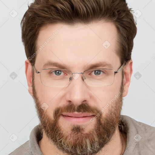 Joyful white adult male with short  brown hair and grey eyes