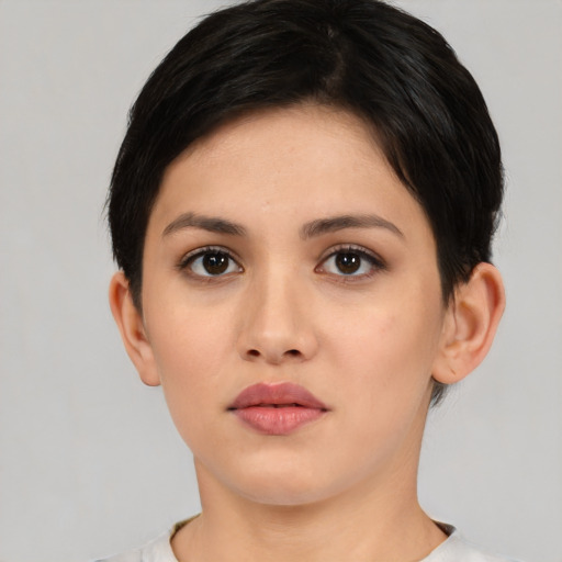 Neutral white young-adult female with short  brown hair and brown eyes