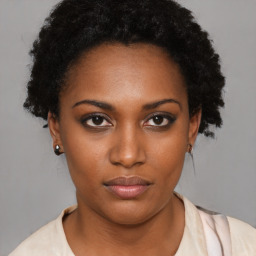 Neutral black young-adult female with short  brown hair and brown eyes