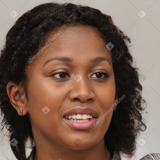 Joyful black young-adult female with medium  brown hair and brown eyes