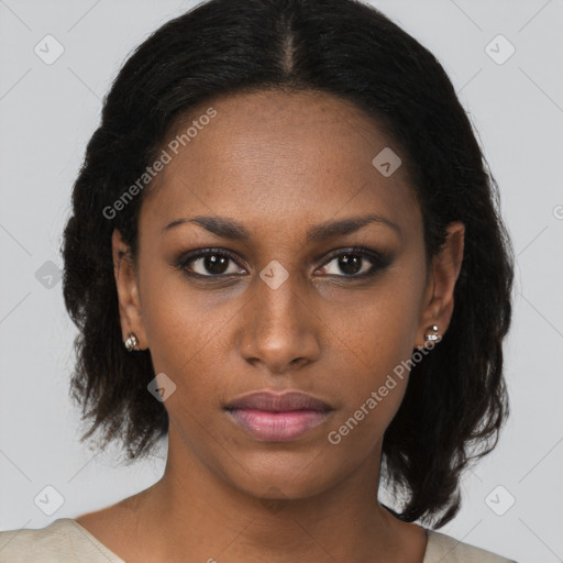 Neutral black young-adult female with medium  brown hair and brown eyes