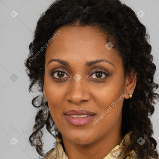 Joyful black young-adult female with medium  brown hair and brown eyes