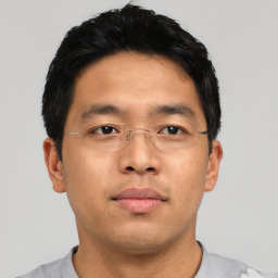 Neutral asian young-adult male with short  brown hair and brown eyes