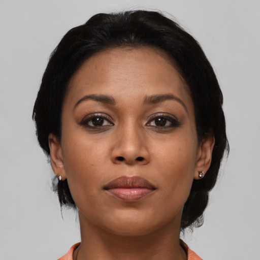 Joyful asian young-adult female with medium  black hair and brown eyes