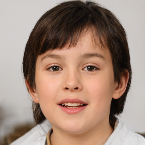 Joyful white child female with medium  brown hair and brown eyes