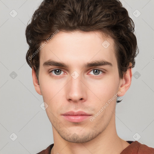 Neutral white young-adult male with short  brown hair and grey eyes