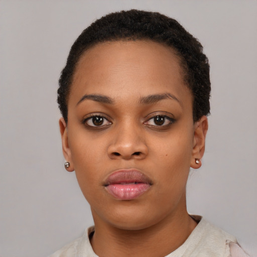 Neutral black young-adult female with short  black hair and brown eyes