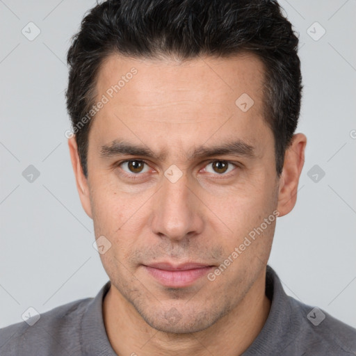 Neutral white adult male with short  brown hair and brown eyes