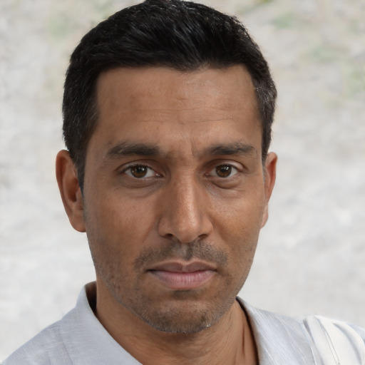 Neutral black adult male with short  black hair and brown eyes
