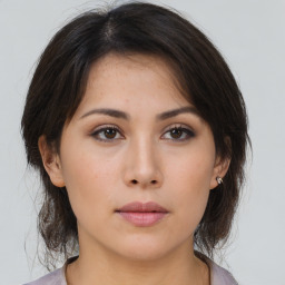 Neutral asian young-adult female with medium  brown hair and brown eyes