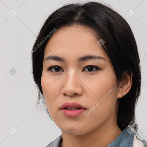 Neutral asian young-adult female with medium  black hair and brown eyes