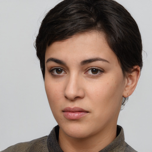 Neutral white young-adult female with medium  brown hair and brown eyes