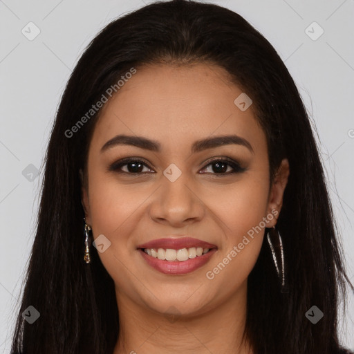 Joyful latino young-adult female with long  brown hair and brown eyes