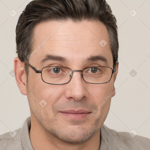 Joyful white adult male with short  brown hair and grey eyes