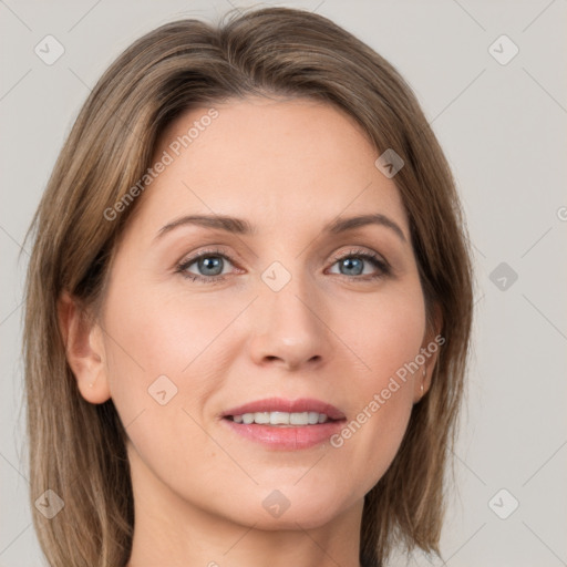 Joyful white adult female with medium  brown hair and green eyes