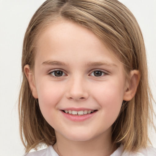 Joyful white child female with medium  brown hair and brown eyes