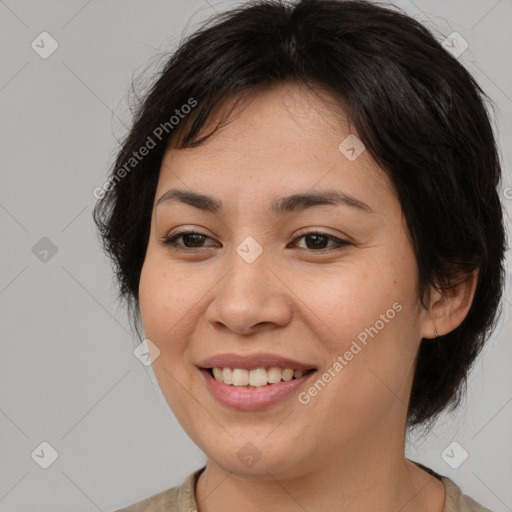 Joyful white young-adult female with medium  brown hair and brown eyes