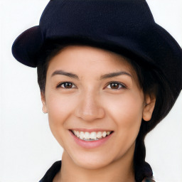 Joyful latino young-adult female with short  black hair and brown eyes