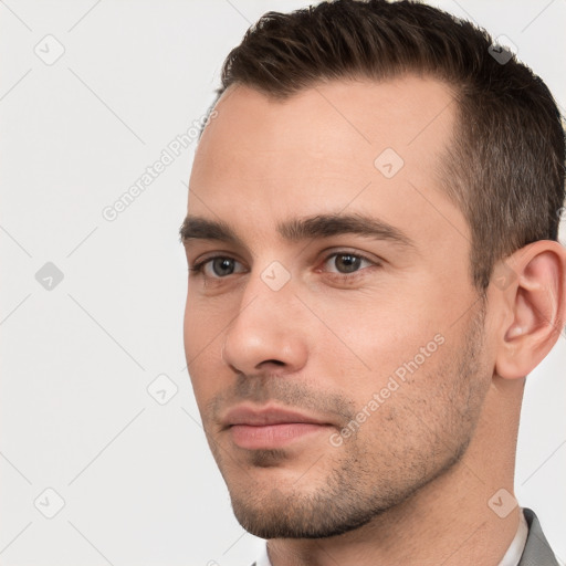 Neutral white young-adult male with short  brown hair and brown eyes