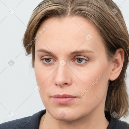 Neutral white young-adult female with medium  brown hair and grey eyes