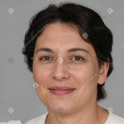 Joyful white adult female with medium  brown hair and brown eyes