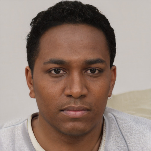 Neutral black young-adult male with short  black hair and brown eyes