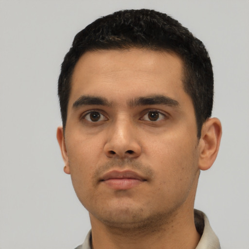 Neutral latino young-adult male with short  black hair and brown eyes