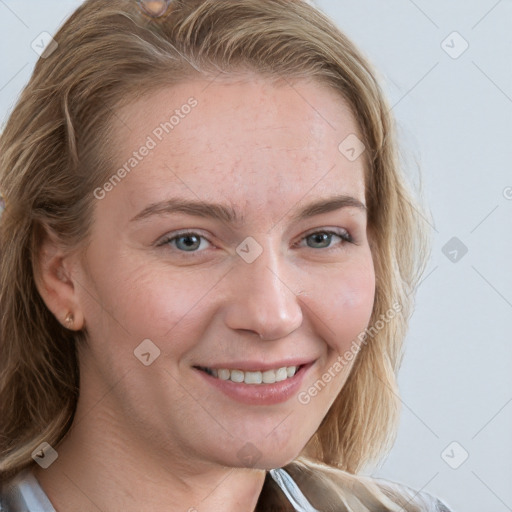 Joyful white young-adult female with medium  brown hair and blue eyes