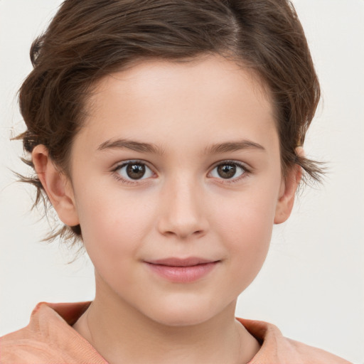 Joyful white child female with short  brown hair and brown eyes