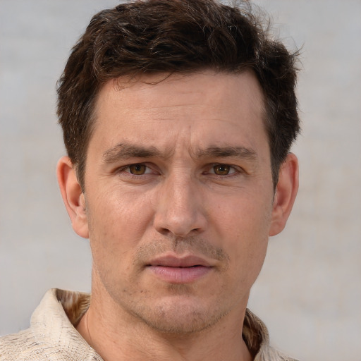 Neutral white adult male with short  brown hair and brown eyes