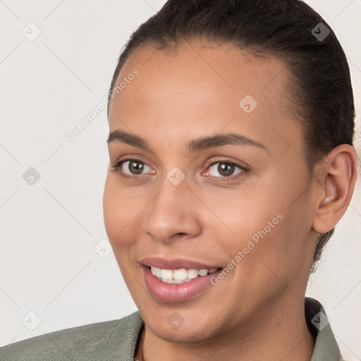 Joyful white young-adult female with short  brown hair and brown eyes