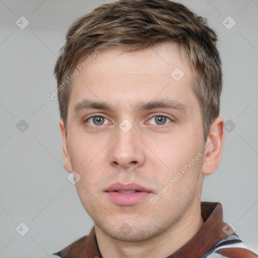 Neutral white young-adult male with short  brown hair and grey eyes