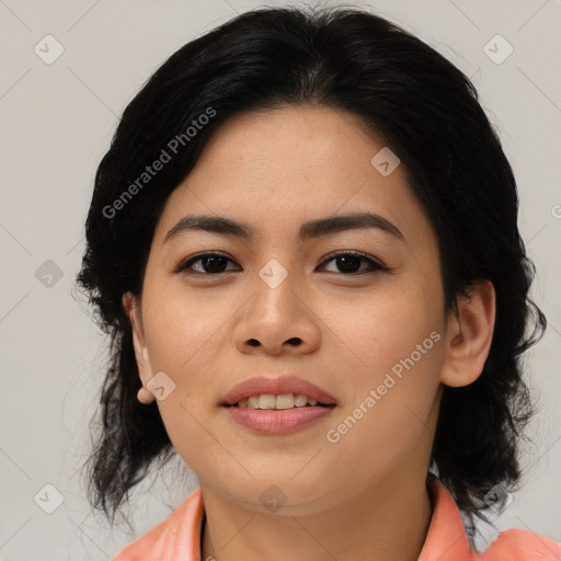 Joyful asian young-adult female with medium  black hair and brown eyes