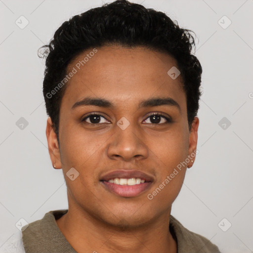 Joyful black young-adult male with short  black hair and brown eyes