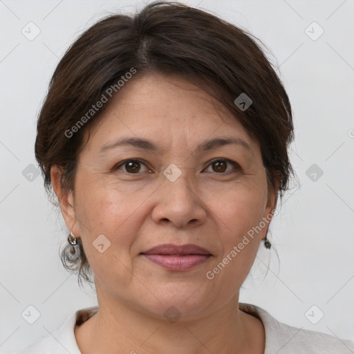 Joyful white adult female with short  brown hair and brown eyes