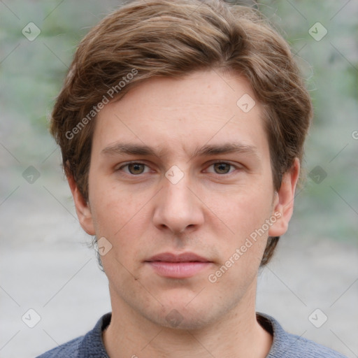 Neutral white young-adult male with short  brown hair and grey eyes