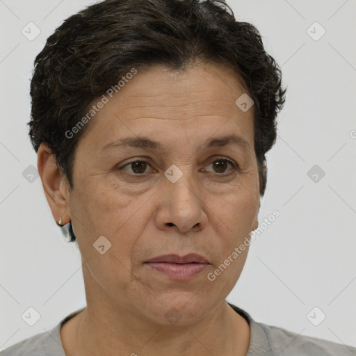 Joyful white adult female with short  brown hair and brown eyes